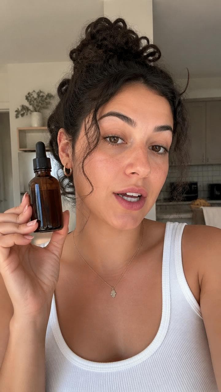 AI creator presenting a skincare product in a UGC style video ad